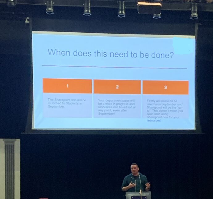 A photo of Ben Ford delivering an INSET training session to teachers.